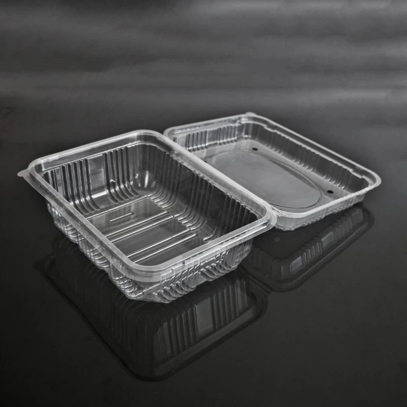 Caixa de fruita amb closca amb forats